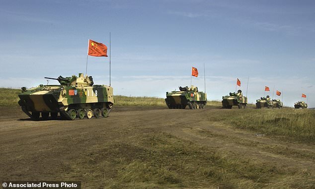 رزمایش مشترک روسیه و چین در مناطق هم مرز با سین‌کیانگ